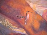 a painting of a lizard on the arm of a person