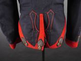 a close up of a military jacket with red trims and buttons