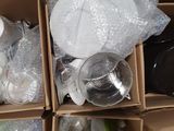 many boxes of empty bottles and containers on the floor