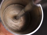 a close up view of a coffee pot with a handle