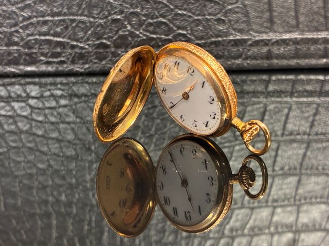 Montre de poche « à gousset » en or ciselé 18 carats 750 millième...