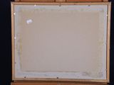painting on easel with a black background and a black background