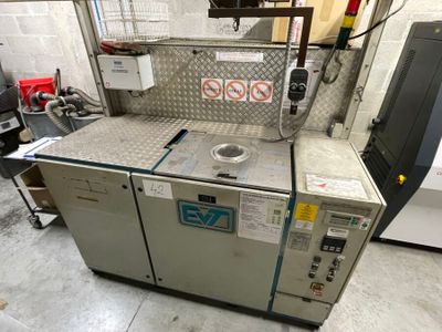 an image of a machine that is in a garage