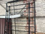 a ladder that is attached to a wall in a building