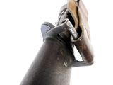 a close up of a gun on a white background
