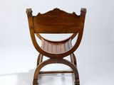 a wooden chair with a wooden seat on a white background
