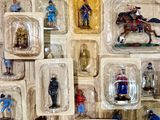 a lot of toy soldiers on display on the wall