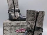 two pairs of women ' s boots with buckles and a snake skin pattern