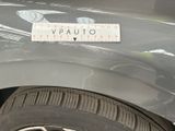 a sticker on the side of a car with a measuring tape on it