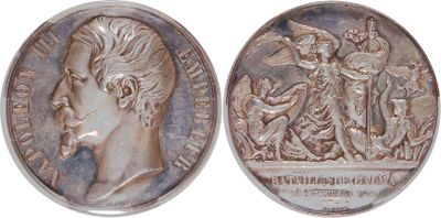 a close up of a coin with a woman on it