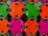 a colorful pattern of light bulbs on a black background