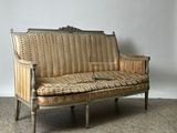 a couch that is sitting on the floor in a room