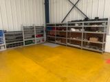 a yellow floor in a warehouse with shelves and boxes