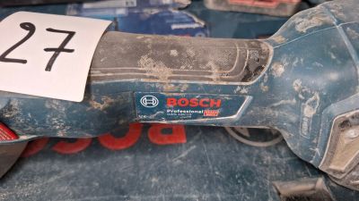 a close up of a corded sander with a number on it