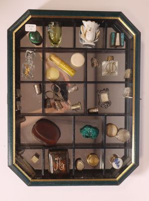 a picture of a display case with various items in it
