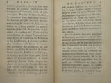an open book with a black and white image on it