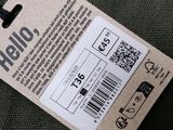 a tag that says hello on it on the back of a jacket