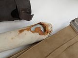 a piece of paper that has been torn off of a pair of pants