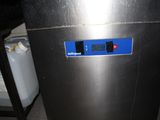 an image of a stainless steel refrigerator in a kitchen