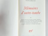 a book open to a page with a picture of a man holding a knife