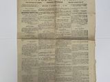 la une d'un journal sur laquelle figure la photo d'un homme tenant un journal
