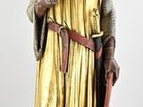 une statue représentant un homme muni d'une épée et d'un bouclier