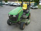 a picture of a tractor parked in a parking lot