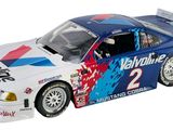 the toy car is blue and white with red, white, and blue stripes