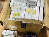 many boxes of electronic devices sitting on a table