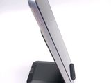 a close up of a cell phone on a stand