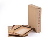 an image of a cardboard box with four pieces of paper in it