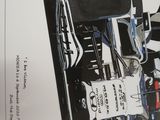 a drawing of a race car on a table