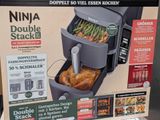 a box with a chicken in it on the shelf