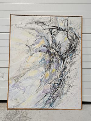 une photo d'un tableau posé par terre dans un garage