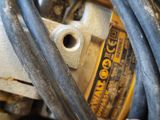 a close up of a motor with wires attached to it