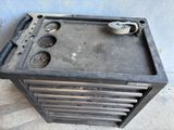 an old stove that is sitting on the floor