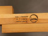 an image of a close up of a piece of wood with a label on it