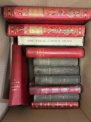 a box full of books that are sitting on a table
