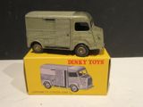 a toy truck that is sitting on top of a box