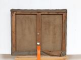 a picture of a painting on a easel with an orange tape