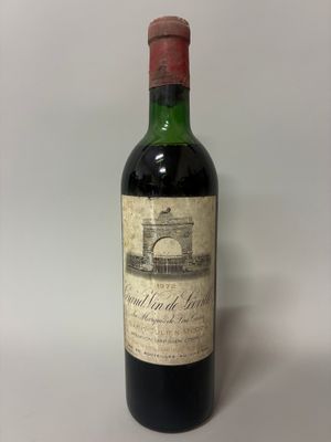 a bottle of wine that is sitting on a table