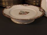 a lot of plates that are sitting on a table