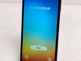 an image of a smartphone with the screen open on a white surface