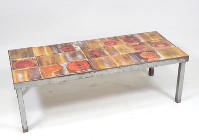a table that has a tile top on it