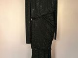 une robe noire sur un mannequin mannequin mannequin mannequin mannequin mannequin mannequin mannequin mannequin mannequin