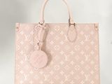 Sac cabas Louis Vuitton en cuir rose à motif Monogram