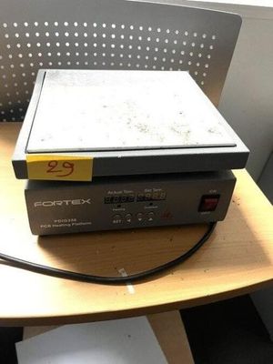 a picture of a computer sitting on top of a wooden table