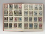 an open book with a lot of stamps on the pages