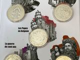 a picture of a book with a bunch of coins on it