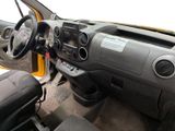 a dashboard of a truck with a steering wheel and dashboard controls